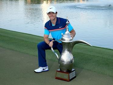 Rory McIlroy with the Dubai Desert Classic trophy